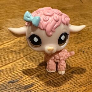 Cute Pink Lamb Figurine with Blue Bow